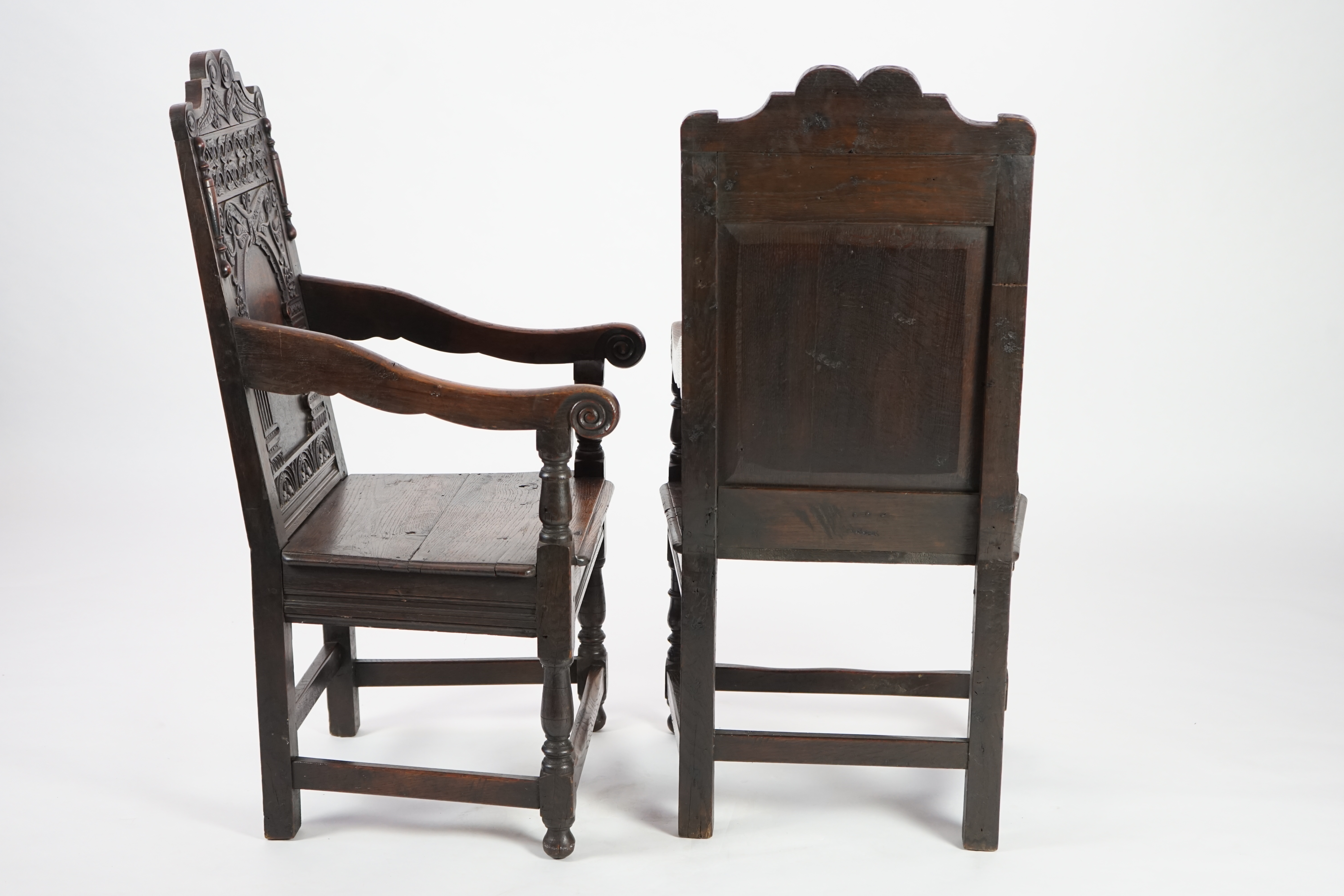 A pair of 17th century style oak Wainscot chairs